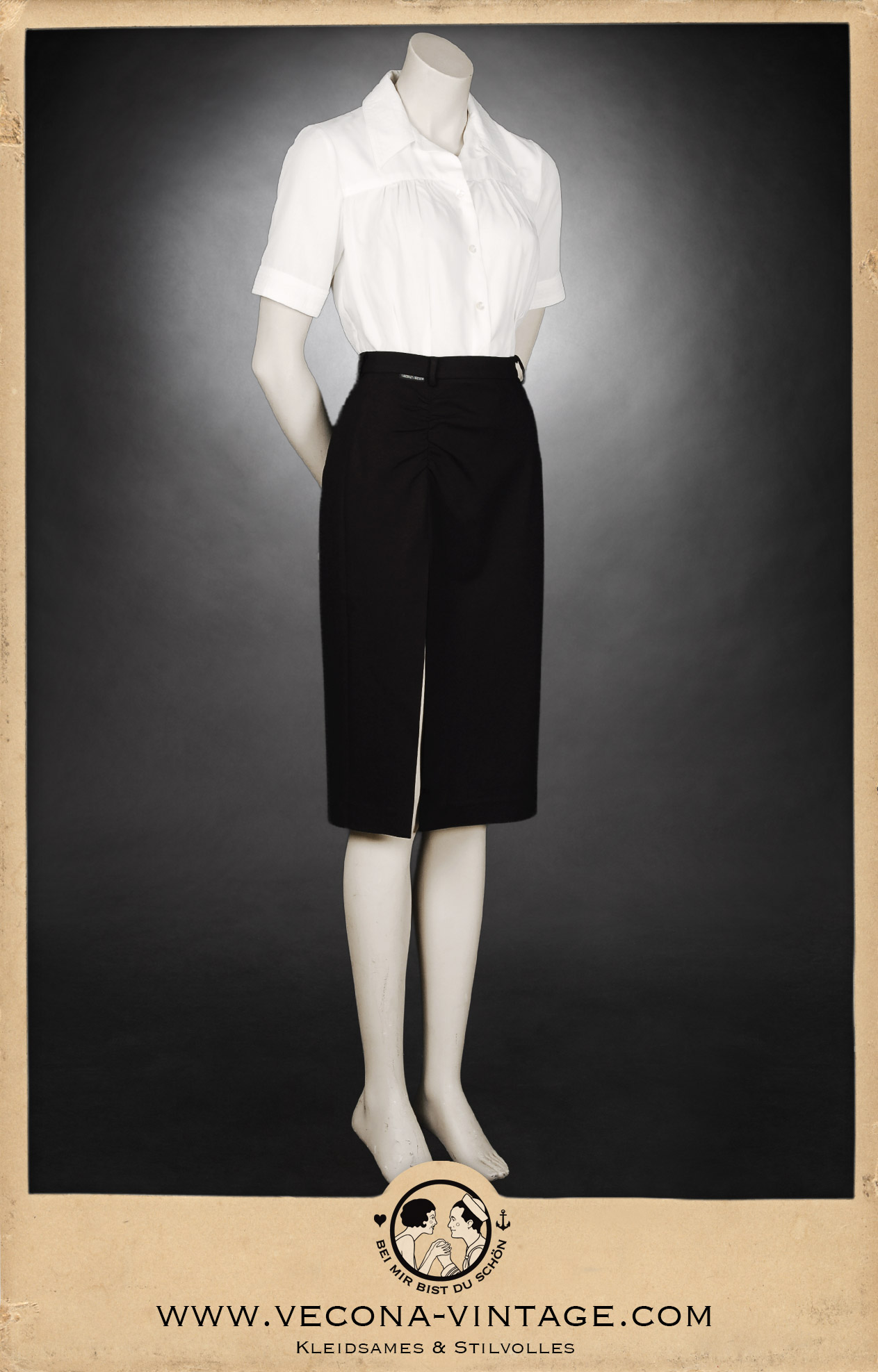 Side view of 1940s high waist pencil skirt Apache in black paired with the short sleeve blouse Greta in cream white.