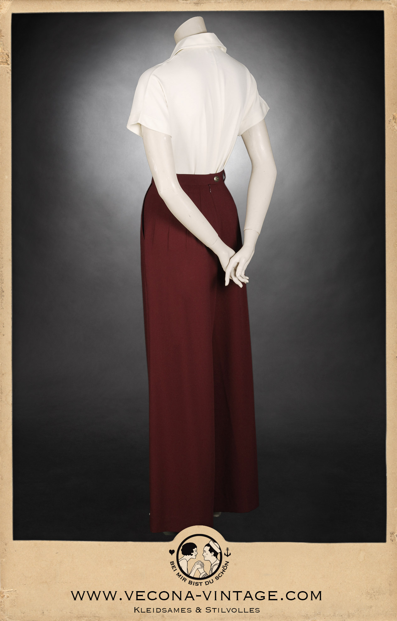 1930s Women’s summer vintage outfit consists of beach pajama palazzo pants Boardwalk Bonnie in deep wine and a cream white cotton polo shirt. Back view.