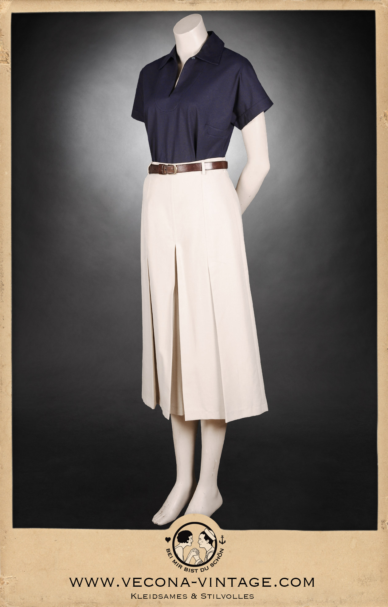 1930s tennis look front view feat. linen culottes High Tide in ecru and womens polo shirt Suzanne in navy blue