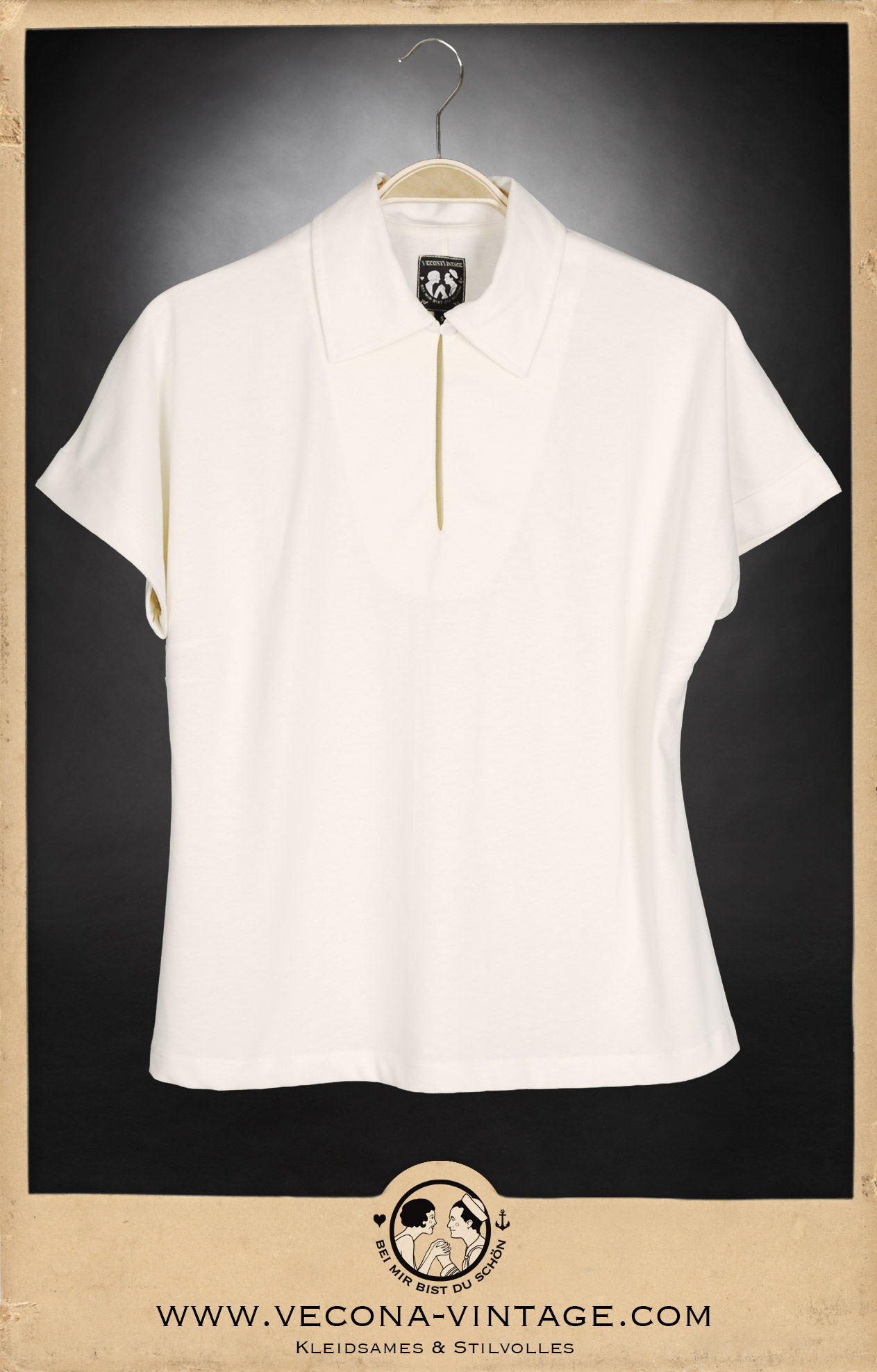 1920s-40s womens jersey shirt in cream white with polo collar, shell button and kimono sleeves. Great for casual summer outfits and vintage sport looks. View on a hanger.