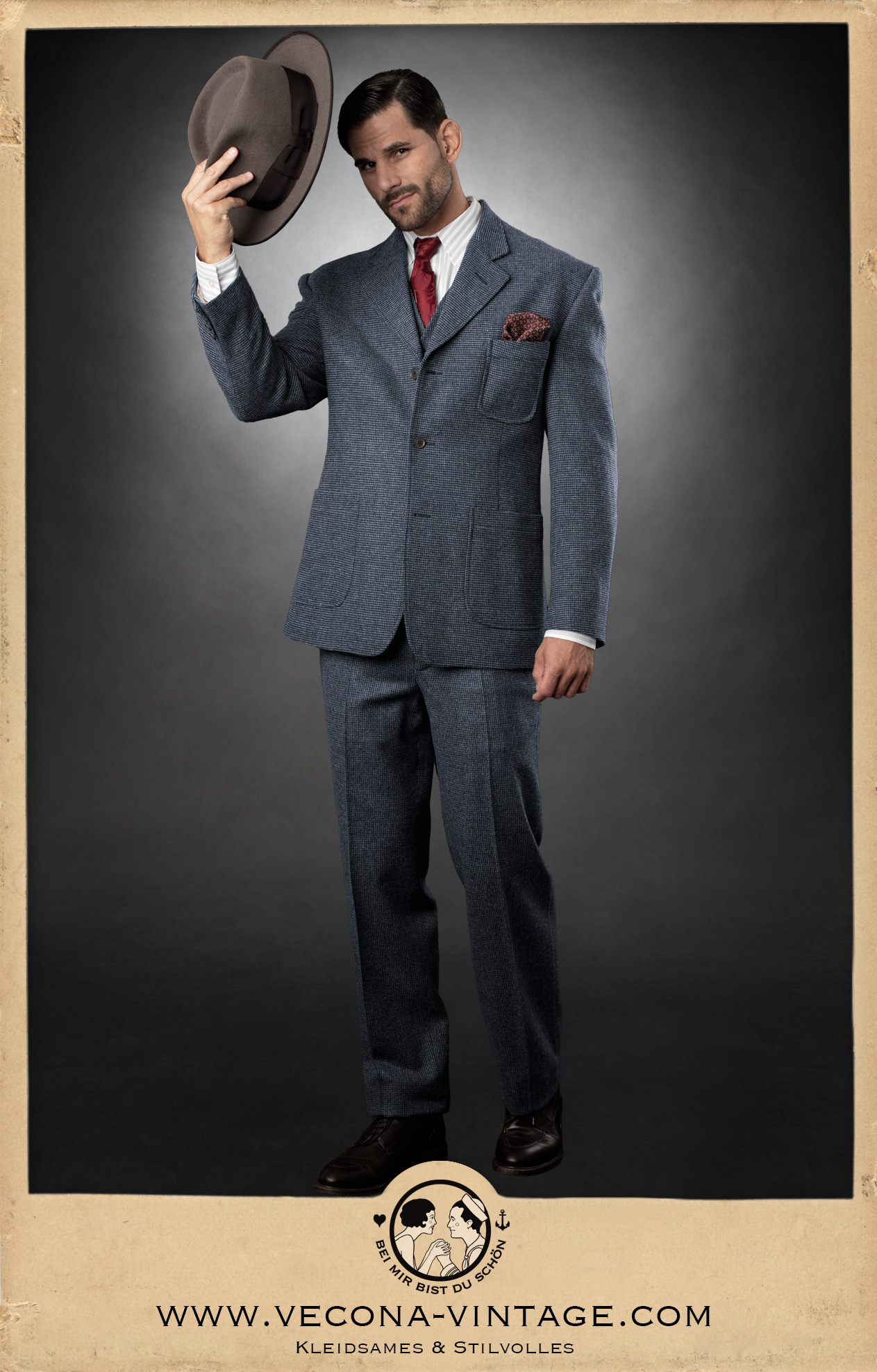 1930s/40s tweed mens suit Hickory Champ in blue/grey houndstooth with enhanced shoulders, back belt jacket and high waisted trousers with flat front, slightly tapered leg and creases.