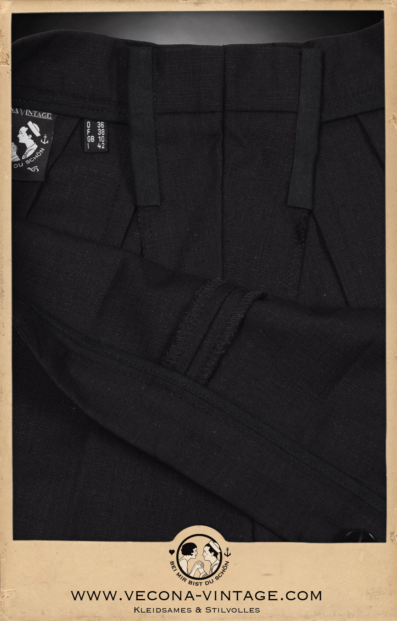 Vintage 1940er Jahre Leinen Shorts schwarz. Die Detailansicht von innen zeigt den geteilten Bund mit reichlich Nahtzugabe für einfache Änderungen und Erweiterung der Bundweite.