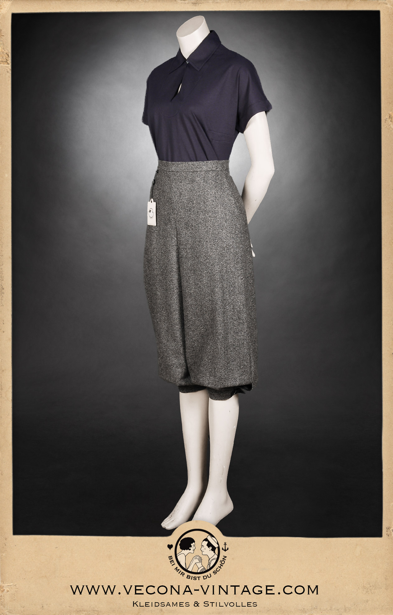 1920s vintage women's outfit consisting high waisted tweed knickerbockers in grey and a navy blue polo shirt, great for tweed rides and vintage sports