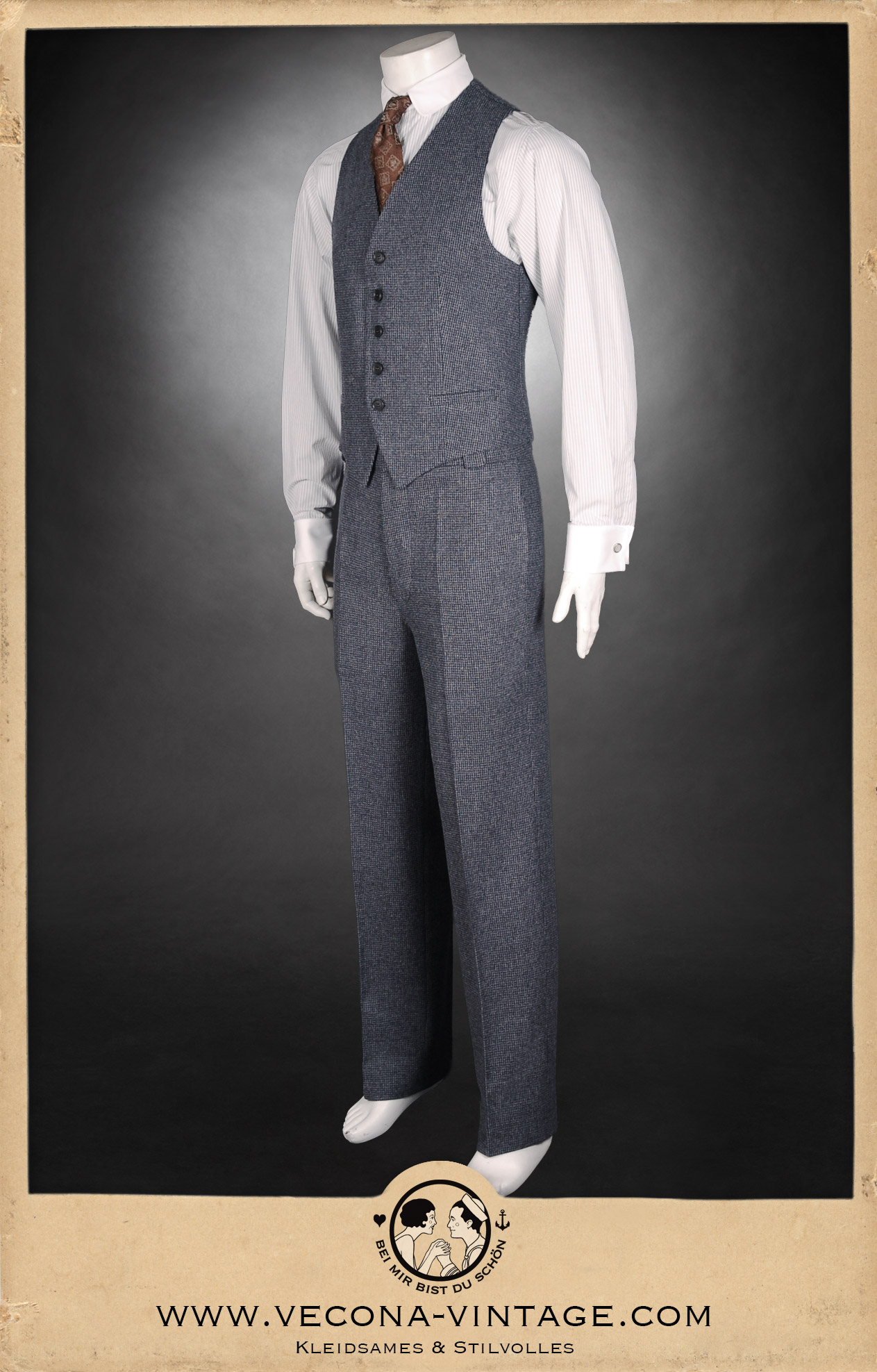 Elegant 1920s men's combination: Blue-grey tweed waistcoat with matching HICKORY CHAMP long trousers, front view.