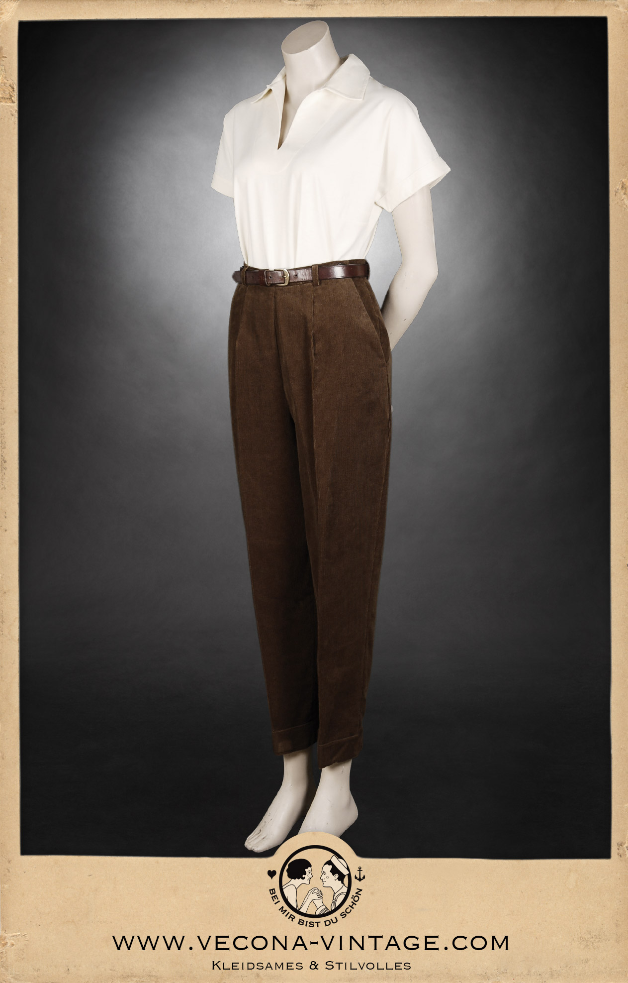 1940s vintage women's outfit consisting high waisted and tapered corduroy trousers and a cream white polo shirt, all made from 100% cotton